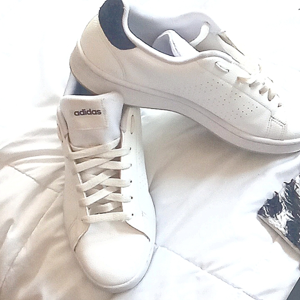 Men's size 10 white and blue leather and suede Adidas.